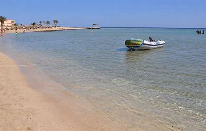 Small boat moored at the calm shore