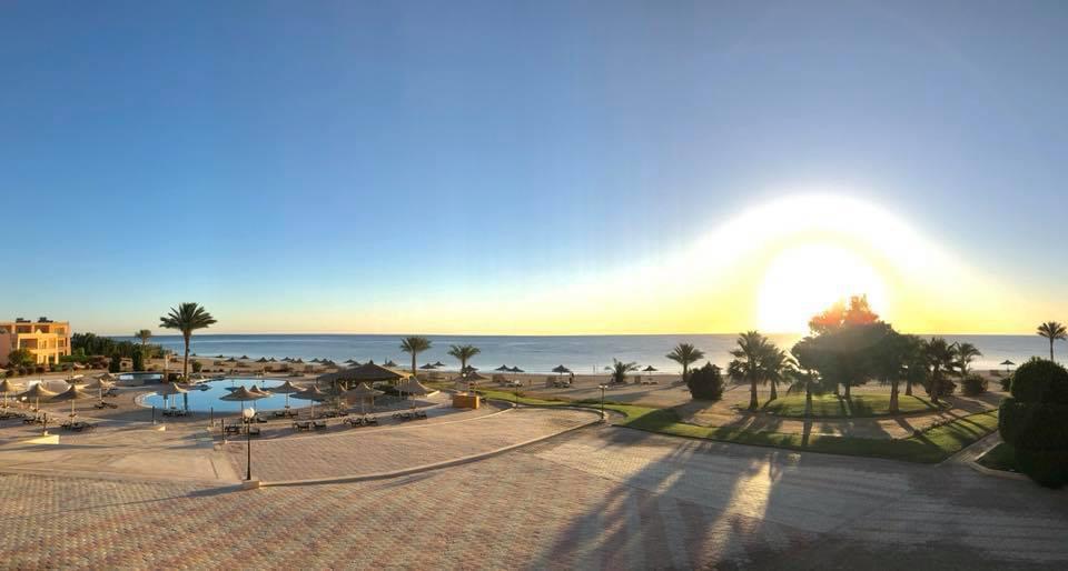 Sunrise over the bay and resort grounds
