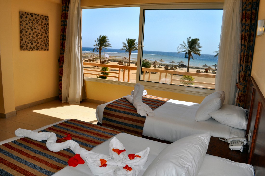 Sea-view twin room with rose-petal turndown